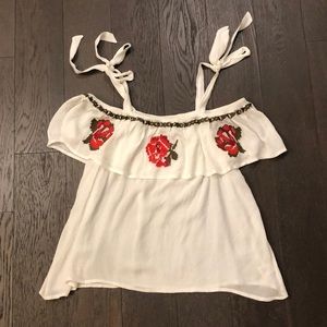 White blouse with flower embroidery